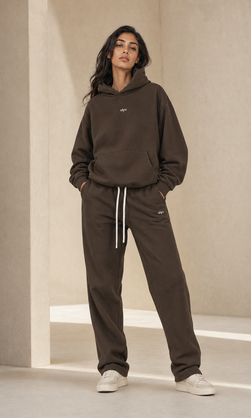 Female adult model wearing the ULYV brown Essential matching set