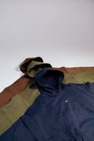 Close view of ULYV essential hoodies in navy olive and brown