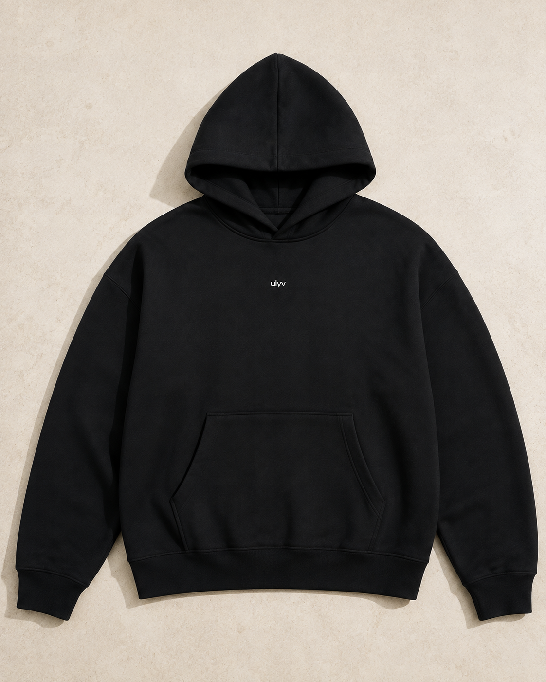 ULYV Black Essential Hoodie product-only studio view