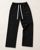 Black ULYV Essential Sweatpants alone, full product studio view