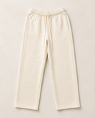Cream ULYV Essential Sweatpants alone, full product studio view