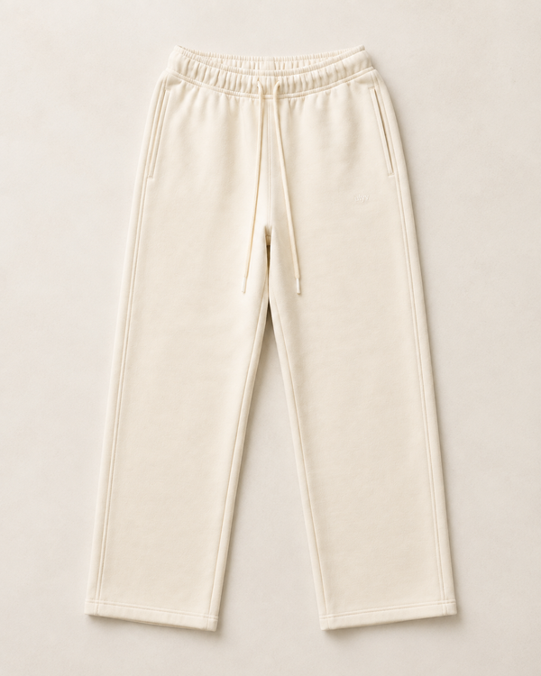 Cream ULYV Essential Sweatpants alone, full product studio view