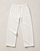 White ULYV Essential Sweatpants alone, full product studio view